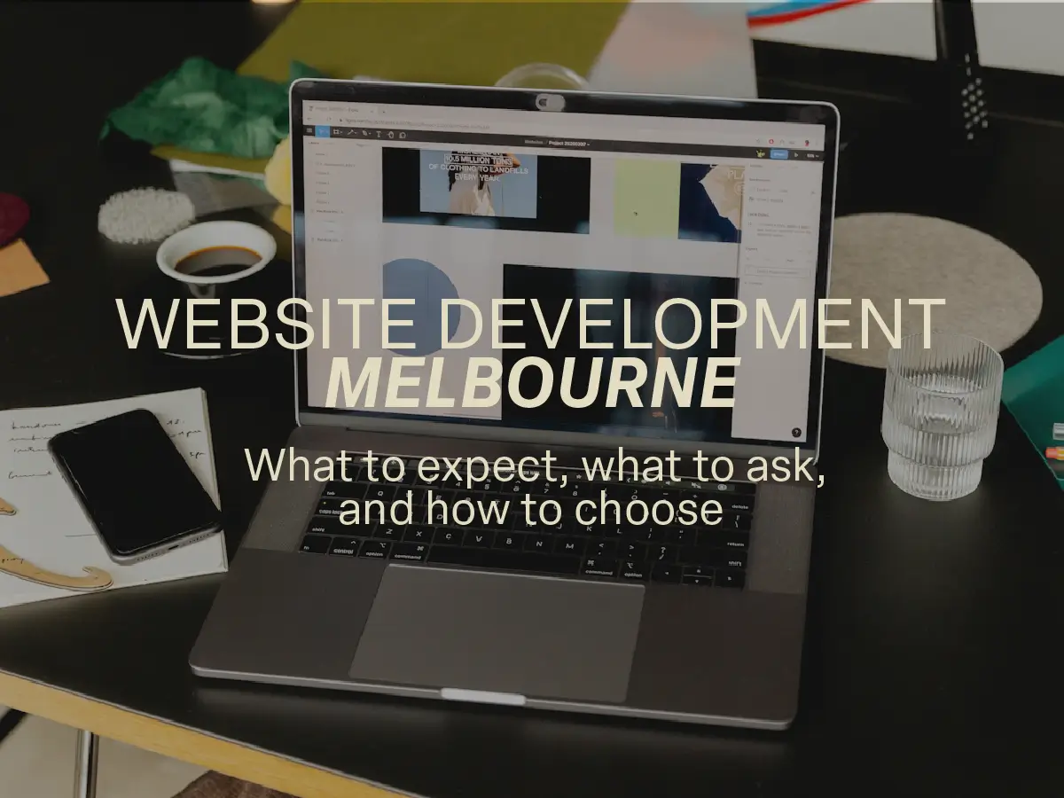 Laptop on a desk with a design tool open, surrounded by coffee and phone, with text "Website Development Melbourne" Laptop on a desk with a design tool open, surrounded by coffee and phone, with text "Website Development Melbourne"