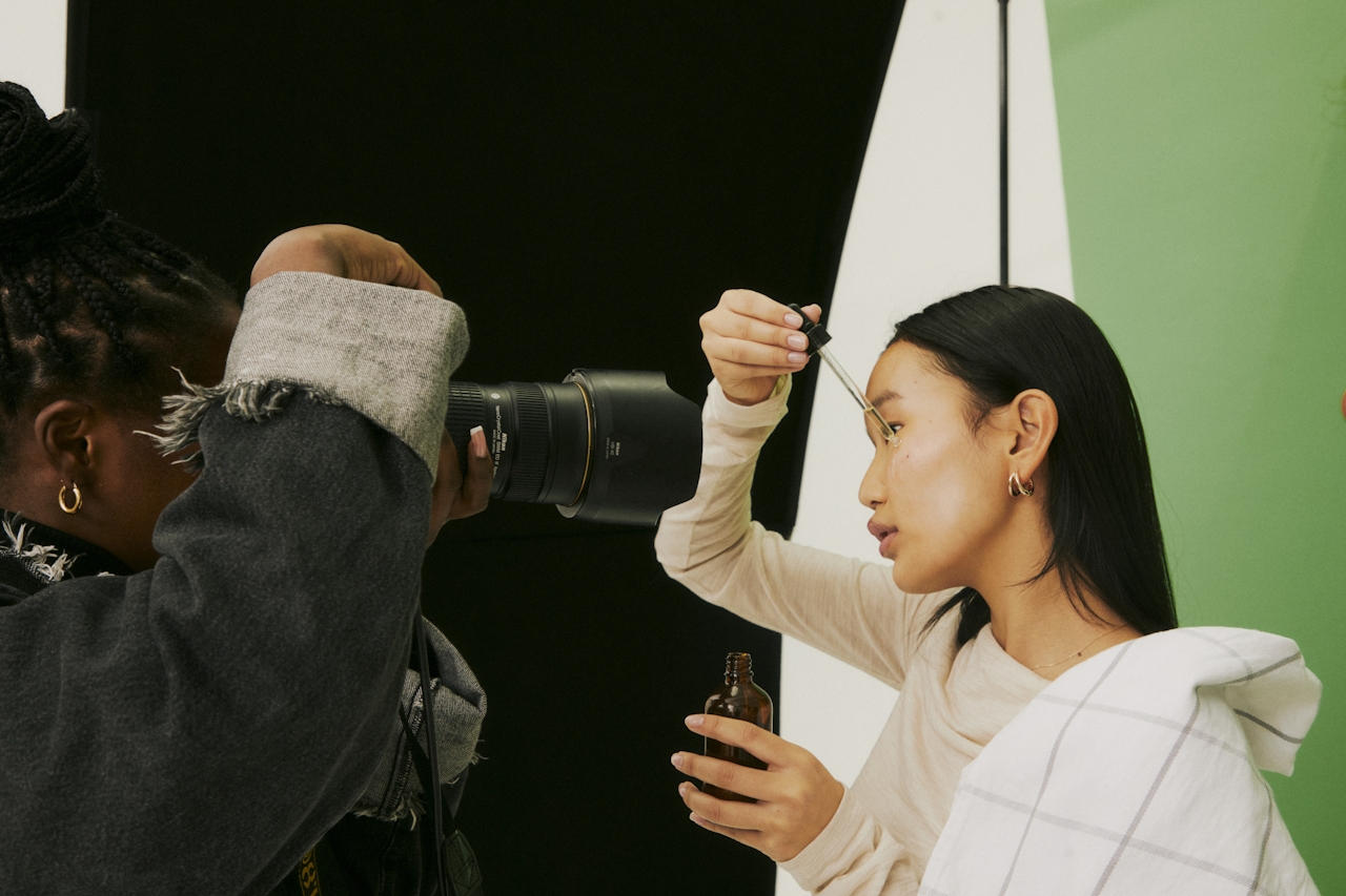 photoshoot of woman creating campaign for facebook ads agency