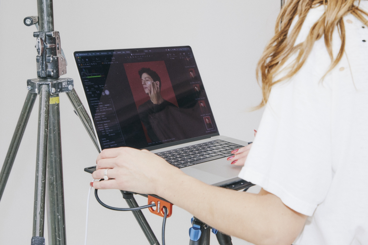 image of woman at facebook ads agency editing image